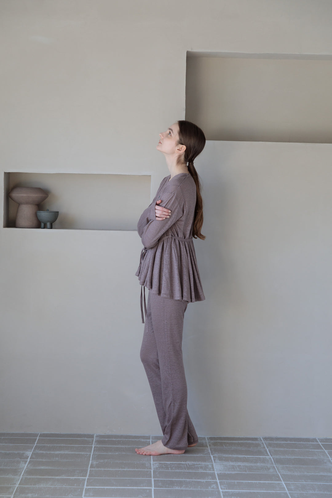 CBD oil in linen cardigan